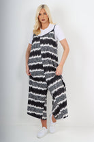 italian animal print deep v neck jumpsuit Jumpsuits & Rompers WearAll