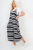 italian animal print deep v neck jumpsuit Jumpsuits & Rompers WearAll